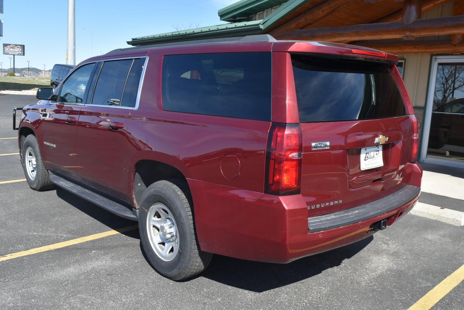 2019 Maroon /Black Chevrolet Suburban LS Fleet (1GNSKKKCXKR) with an 5.3L V-8 engine, 6-Speed Automatic transmission, located at 1600 E Hwy 44, Rapid City, SD, 57703, (605) 716-7878, 44.070232, -103.171410 - Photo#5